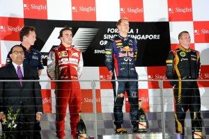 Sebastian Vettel stands on the Singapore podium, just before the jeers starts (Image: Ferrari)